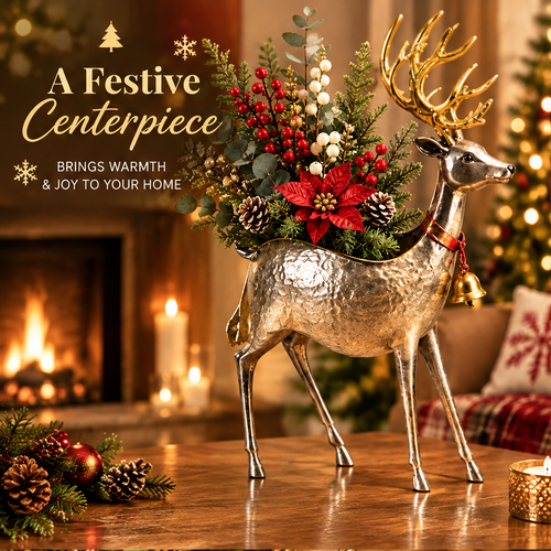 LUMIDED® silver metal reindeer figurine with gold antlers and holiday floral arrangement featuring poinsettia, pine cones, red berries and eucalyptus, displayed on a wooden table by a fireplace